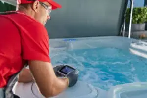 hot tub technician in new hampshire performing hot tub repair